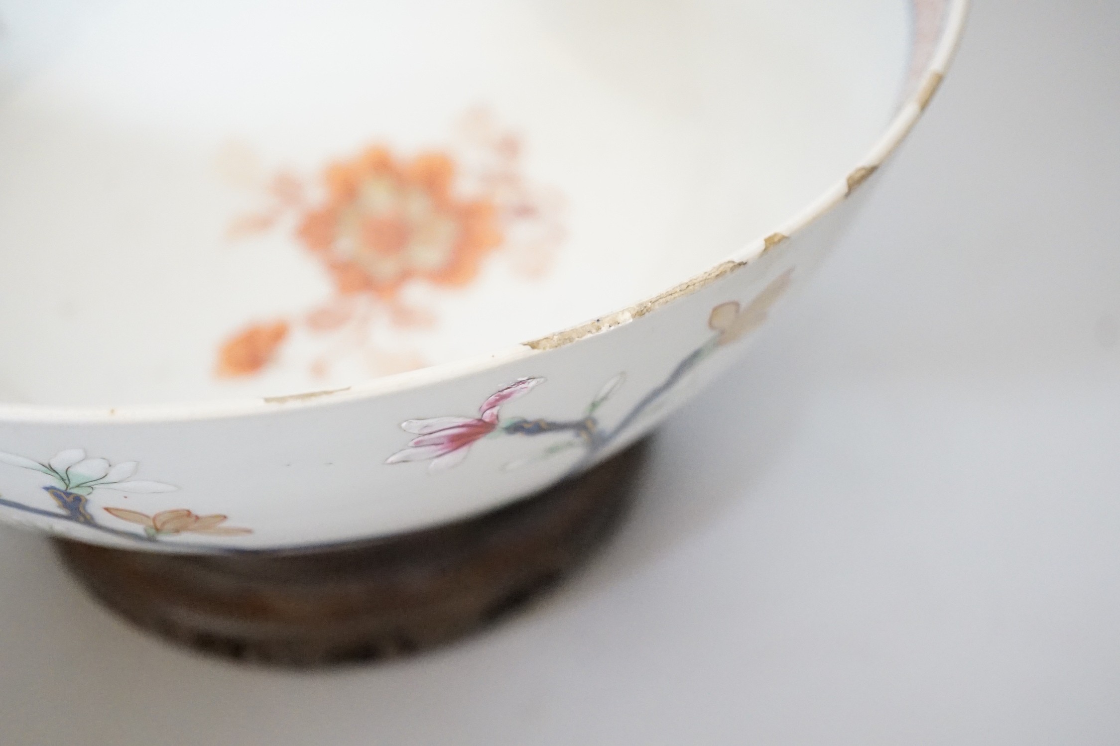 An 18th century Chinese famille rose bowl on wood stand, c.1740, diameter 26cm